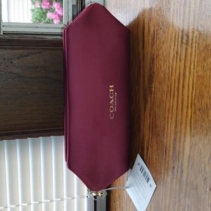 Coach wild rose pink toiletry bag